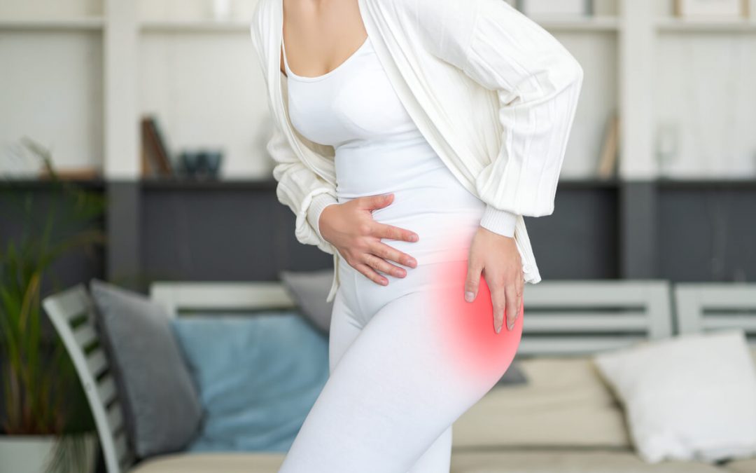 Hip pain, woman suffering from osteoarthritis at home, health problems concept